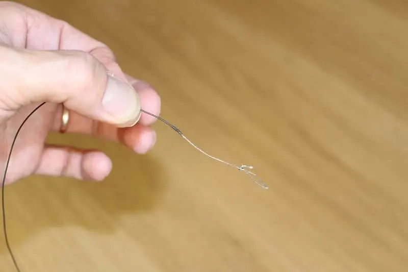 making a small hair loop at the end of a braided hooklink for the pop-up rig