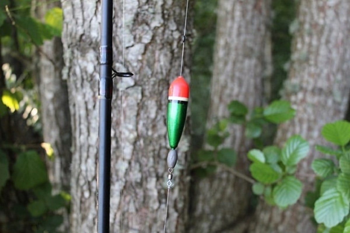 a fishing rod with a rigged slip bobber setup