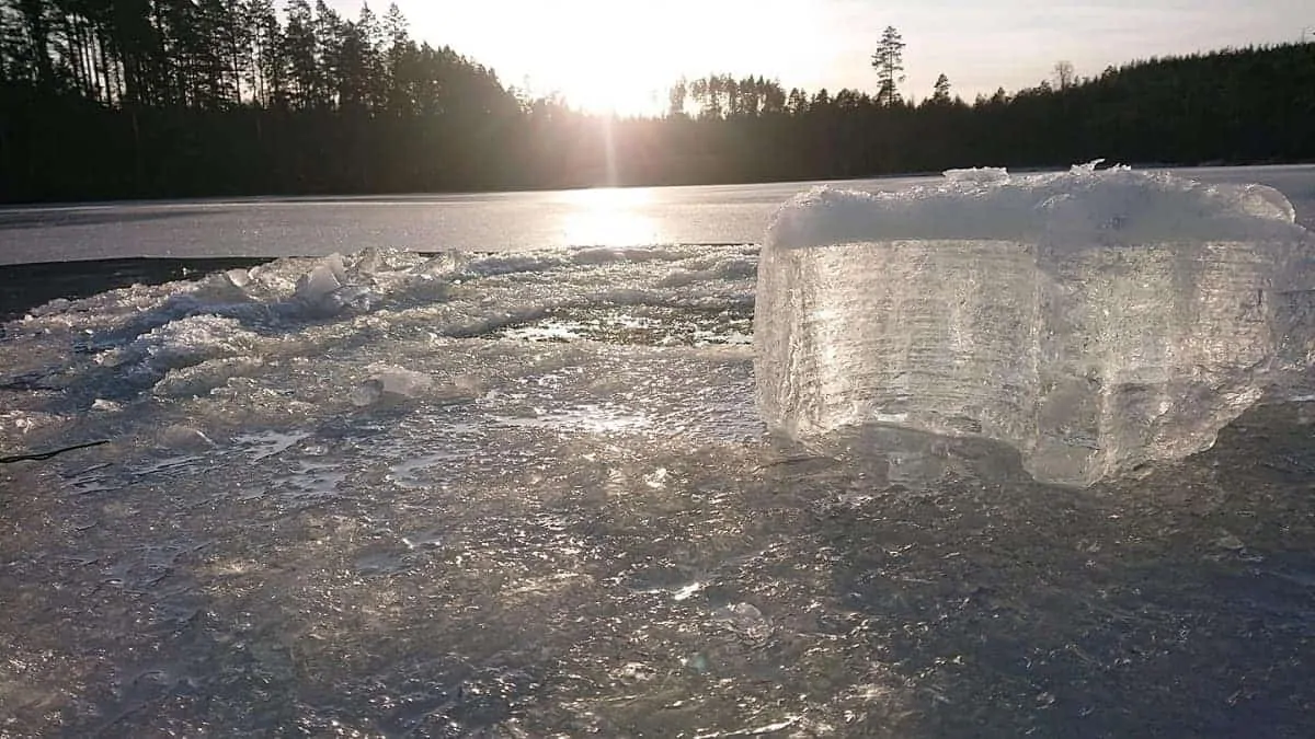 an image of a frozen fishing lake