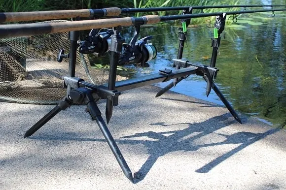 a pair of specialist rods and shimano baitrunners on a rod pod with bite alarms and hangers waiting for a tench bite