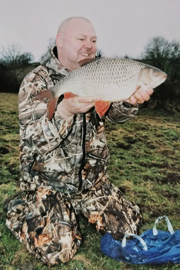 coarse angler keith berry with his stunning UK record roach of 4lb 4oz