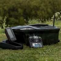 a bait boat for carp fishing with a remote and a fish finder
