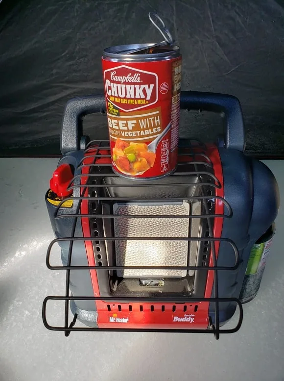 a mr heater portable buddy used as a portable grill to cook food on