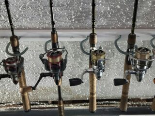 an image of several rods with different series of Pflueger reels