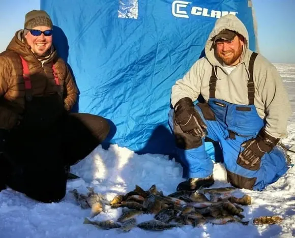 two ice anglers on Leech Lake with a bag limit of yellow perch