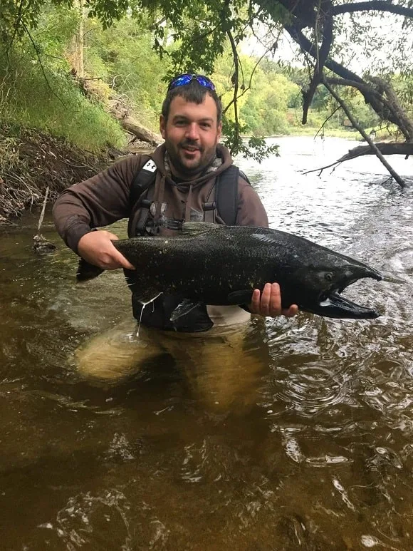 a salmon angler on the Columbia River with a big chinook