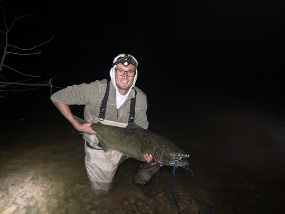 a night angler on the Grand River fishing for salmon