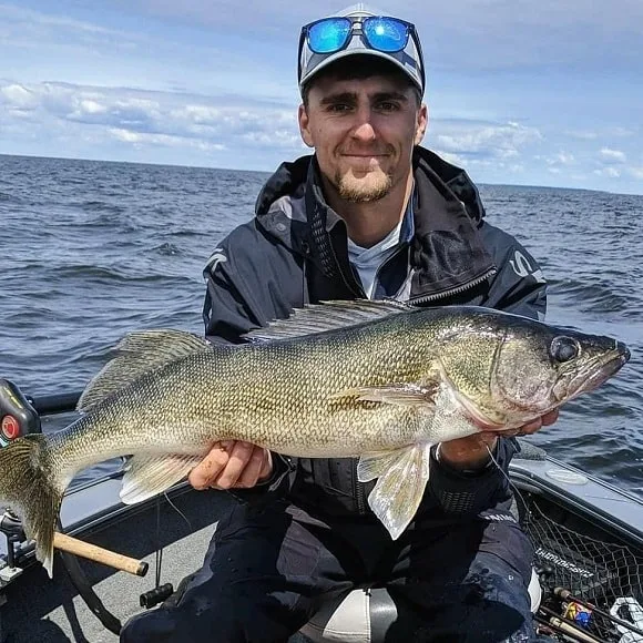 a US angler with a big walleye landed with a ego s2 slider fishing net
