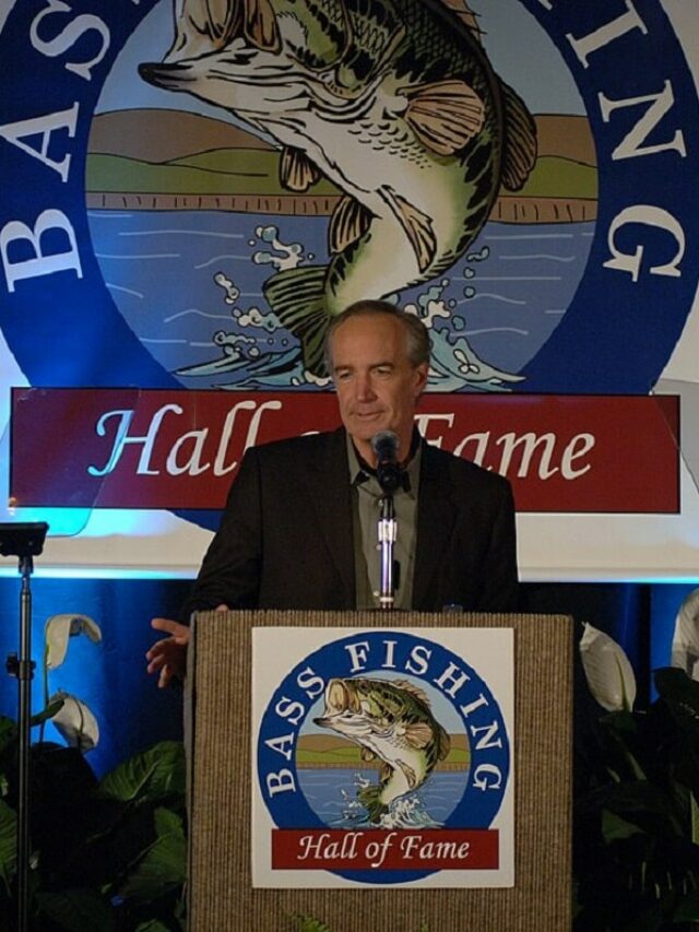 a man speaking at the annual bass fishing hall of fame banquet