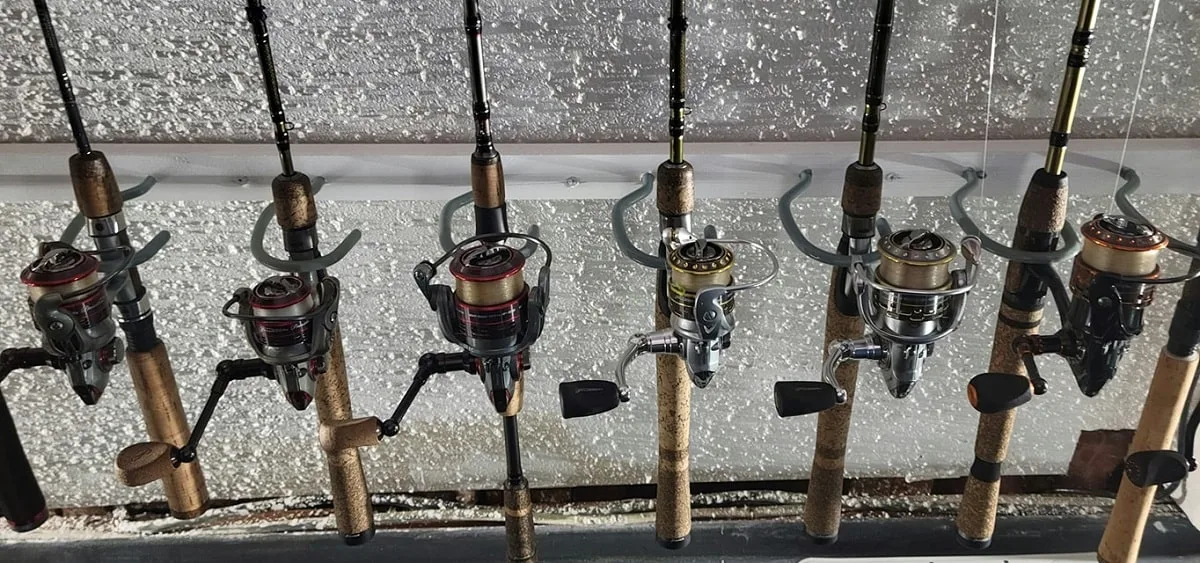 several pflueger president reels mounted on fishing rods